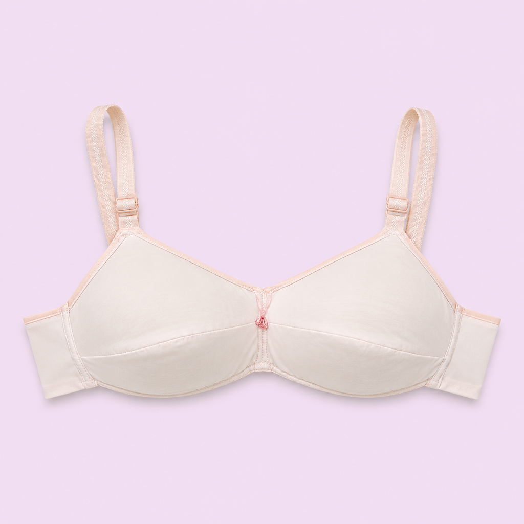 Beige bra on a light purple background