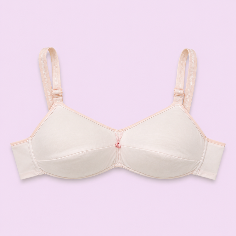 Beige bra on a light purple background