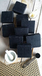 Black soap bars on