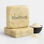 Two blocks of SheRivaj soap with a small bowl of powder Milk and rice 