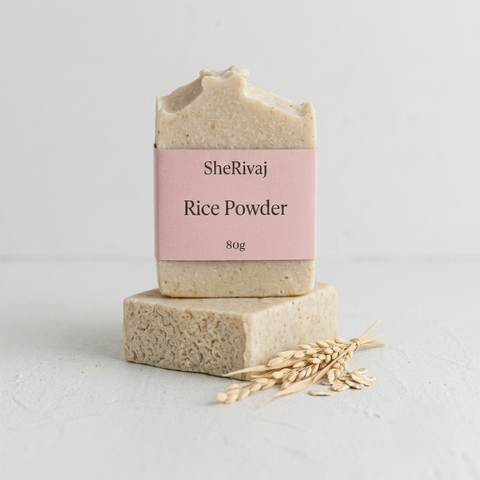 Two blocks of SheRivaj soap with a small bowl of powder Milk and rice 